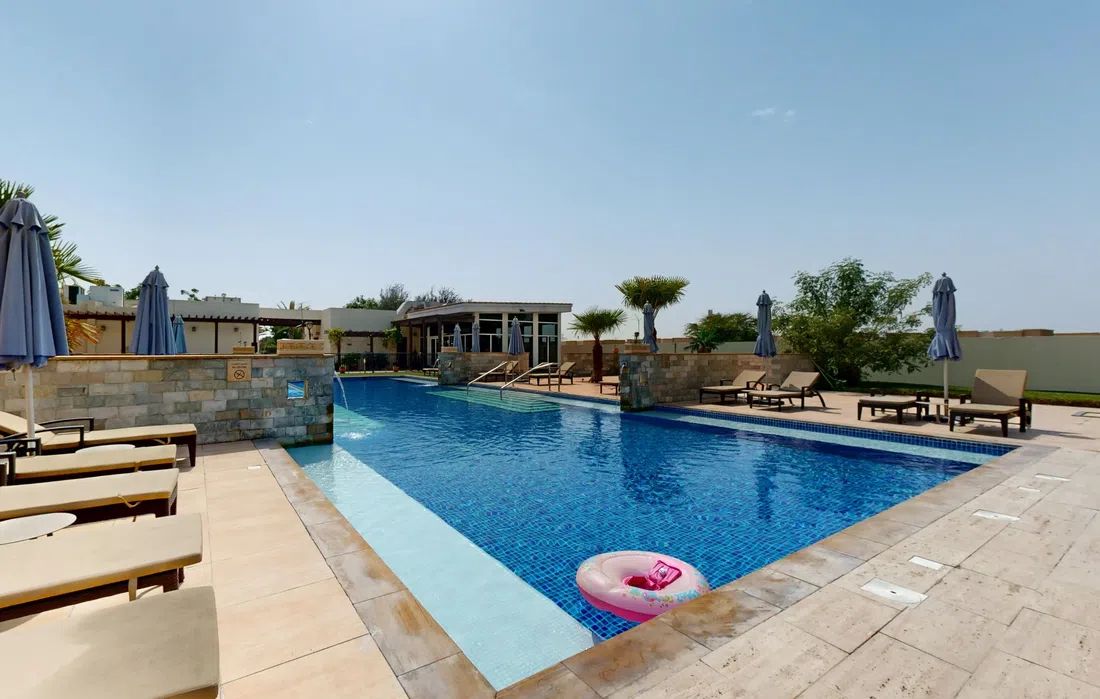Al Habtoor Polo Resort Villas في وادي الصفا 5: حدائق منسّقة — صورة 11