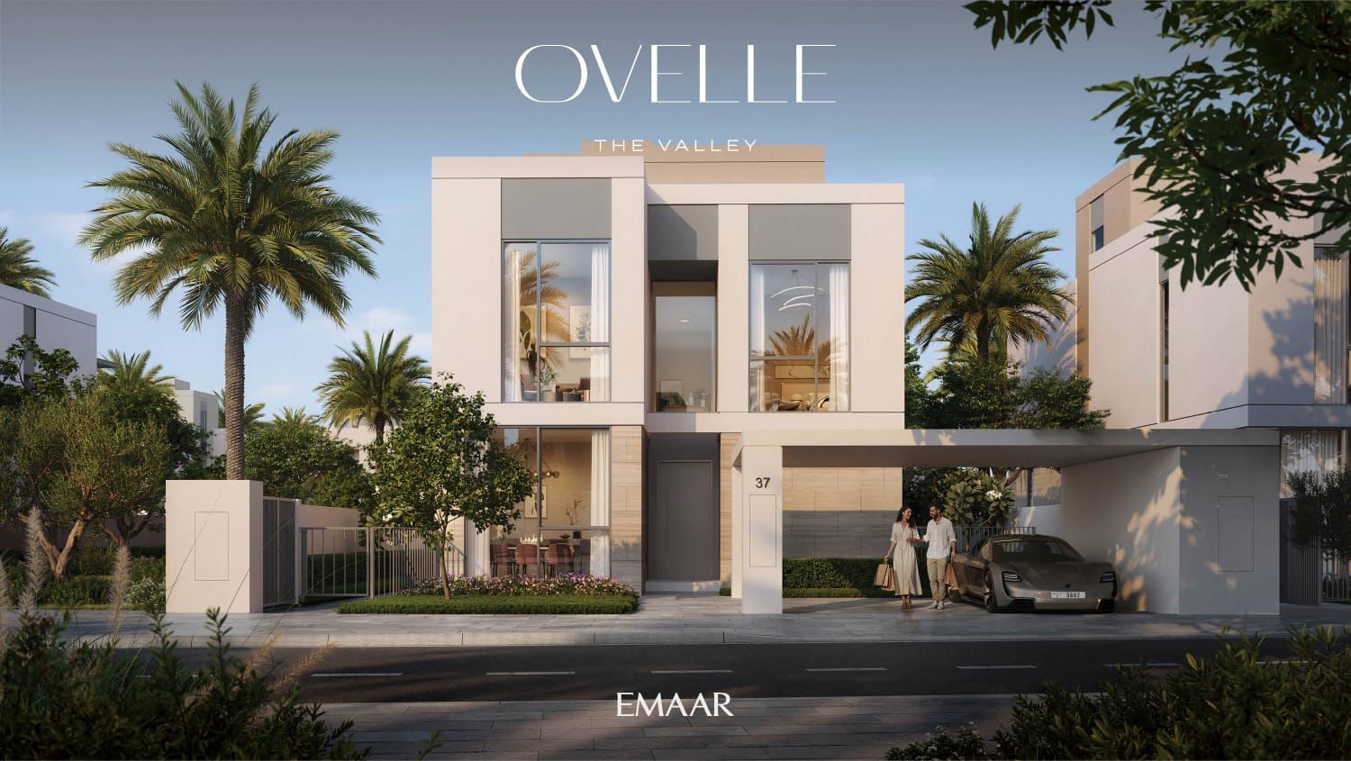Emaar-branded Ovelle front-facade render with tall glazing and covered parking
